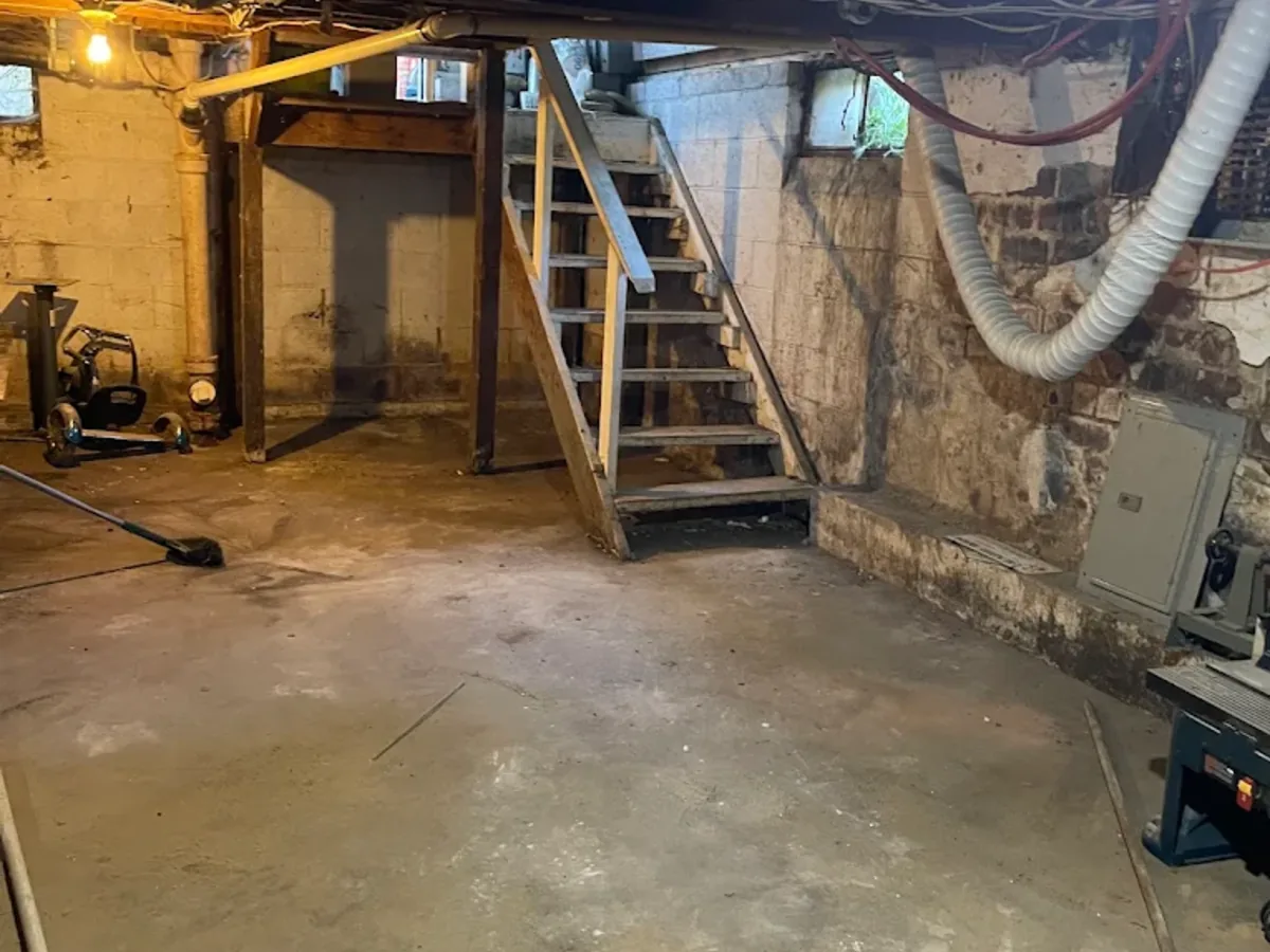 Empty basement after a full junk removal cleanout