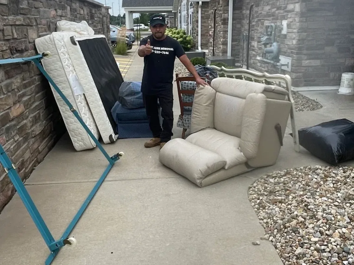 Mattress, box spring and sofa set out for removal